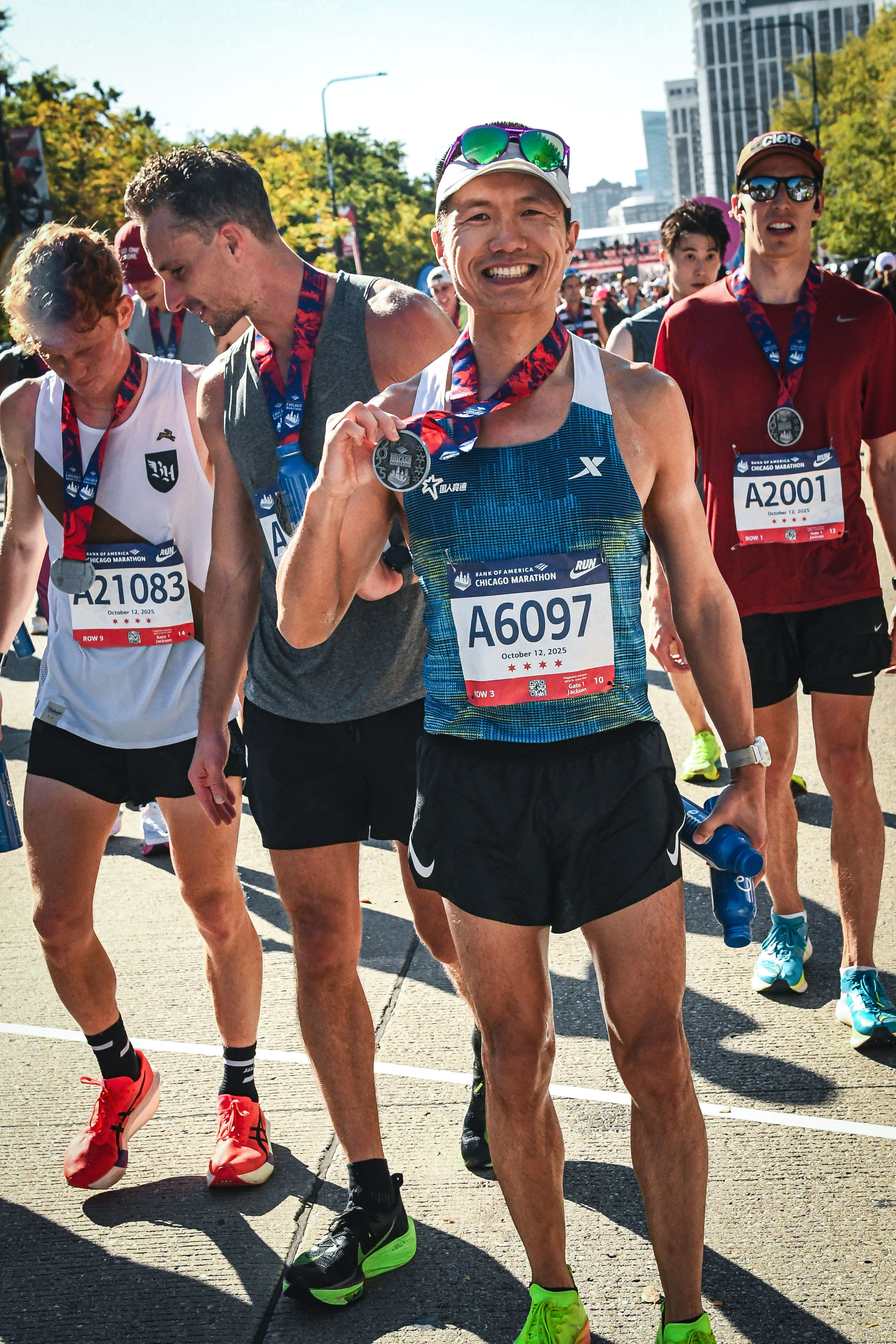 Smiling with the finisher medal